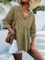Notched neck tiered cotton blend blouse with flounce sleeves, stylish women's top by Trendsi, shown in a light, breathable fabric.