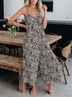 Full size Shopimist tie-dye wide-leg jumpsuit showing vibrant colors, sleeveless design, and relaxed fit for plus size women.