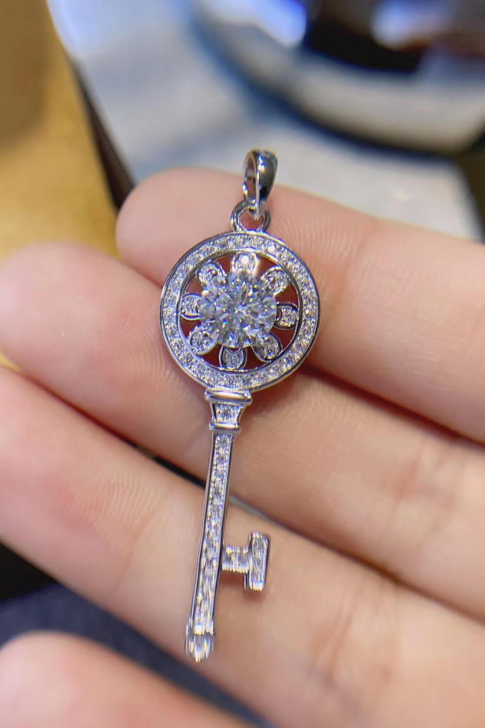 1 Carat Moissanite platinum-plated key pendant necklace with sparkling gemstone and intricate design, stylish jewelry accessory.