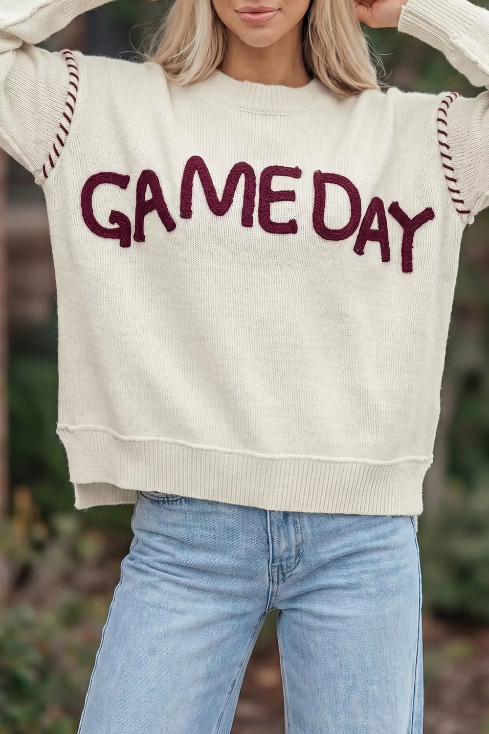 Trendsi Drop Shoulder Game Day Letter Sweater in gray with bold team-themed lettering, cozy knit fabric, and relaxed fit.