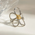 Two-tone Daisy Flower Ring from Shopimist featuring a delicate flower design with mixed metal colors and intricate detailing.