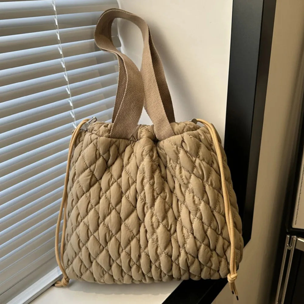 Plush Fashion Hub plush drawstring tote bag with bubble texture, stylish and spacious for everyday use.