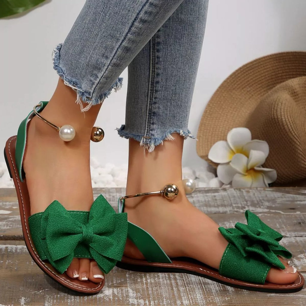 Shopimist bow open toe sandals with stylish straps and a comfortable flat sole, perfect for casual summer wear.