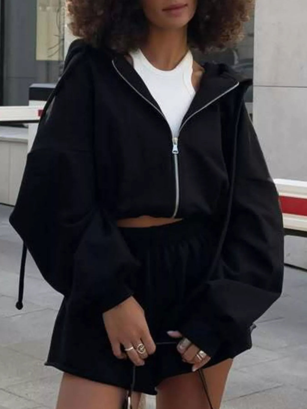 Trendsi zip-up long sleeve outerwear and matching shorts set, casual activewear with a fitted jacket and shorts, black color.