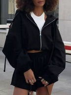 Trendsi zip-up long sleeve outerwear and matching shorts set, casual activewear with a fitted jacket and shorts, black color.