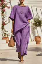 Women’s casual resort loose short-sleeve top and pants set by Plush Fashion Hub, displayed on a model in relaxed style.