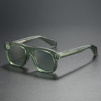 Unisex acetate-style polarized fashion sunglasses with a luxury look, featuring stylish frames and tinted lenses.