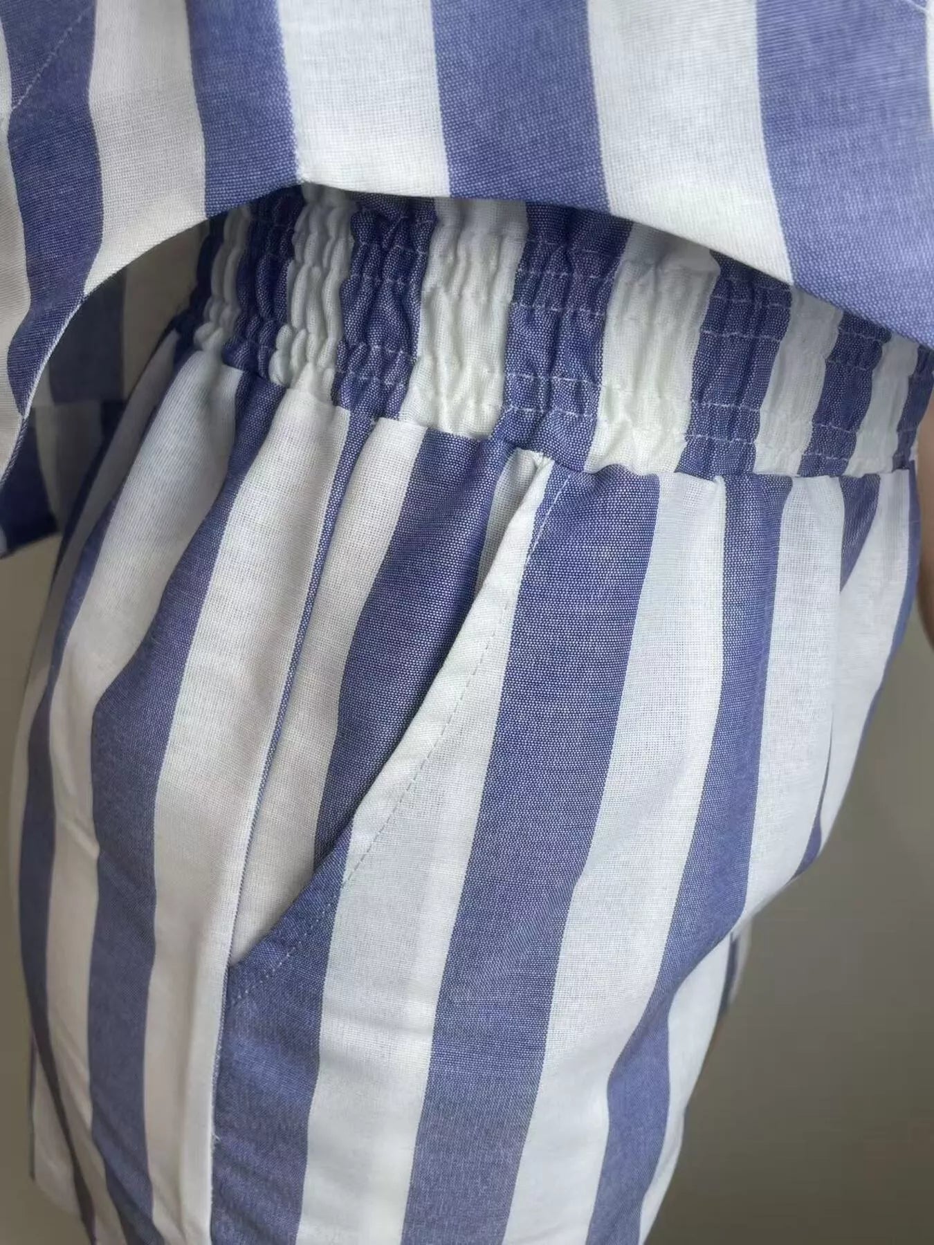 Striped button-up top and shorts set by Shopimist, featuring a stylish casual summer outfit with matching striped fabric.