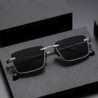 Pure titanium polarized sunglasses with retro British style, lightweight eye wear featuring dark tinted lenses and sleek frame design.