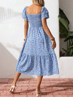 Floral print smocked ruffle sleeve midi dress by Trendsi, lightweight summer dress with feminine floral details and flowy silhouette.