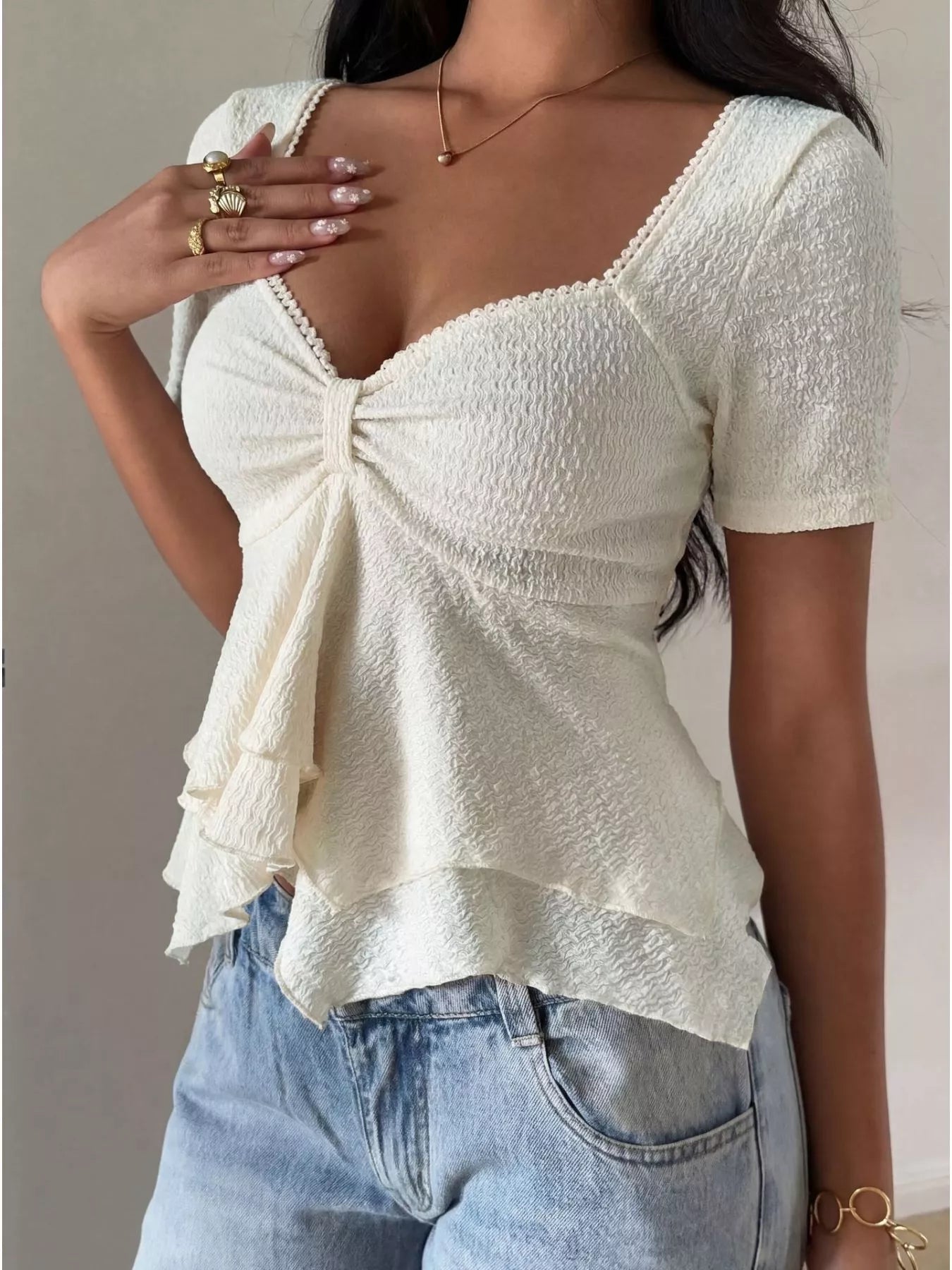 Layered ruffle top with sweetheart neckline from Trendsi, featuring feminine design and stylish details perfect for casual wear.