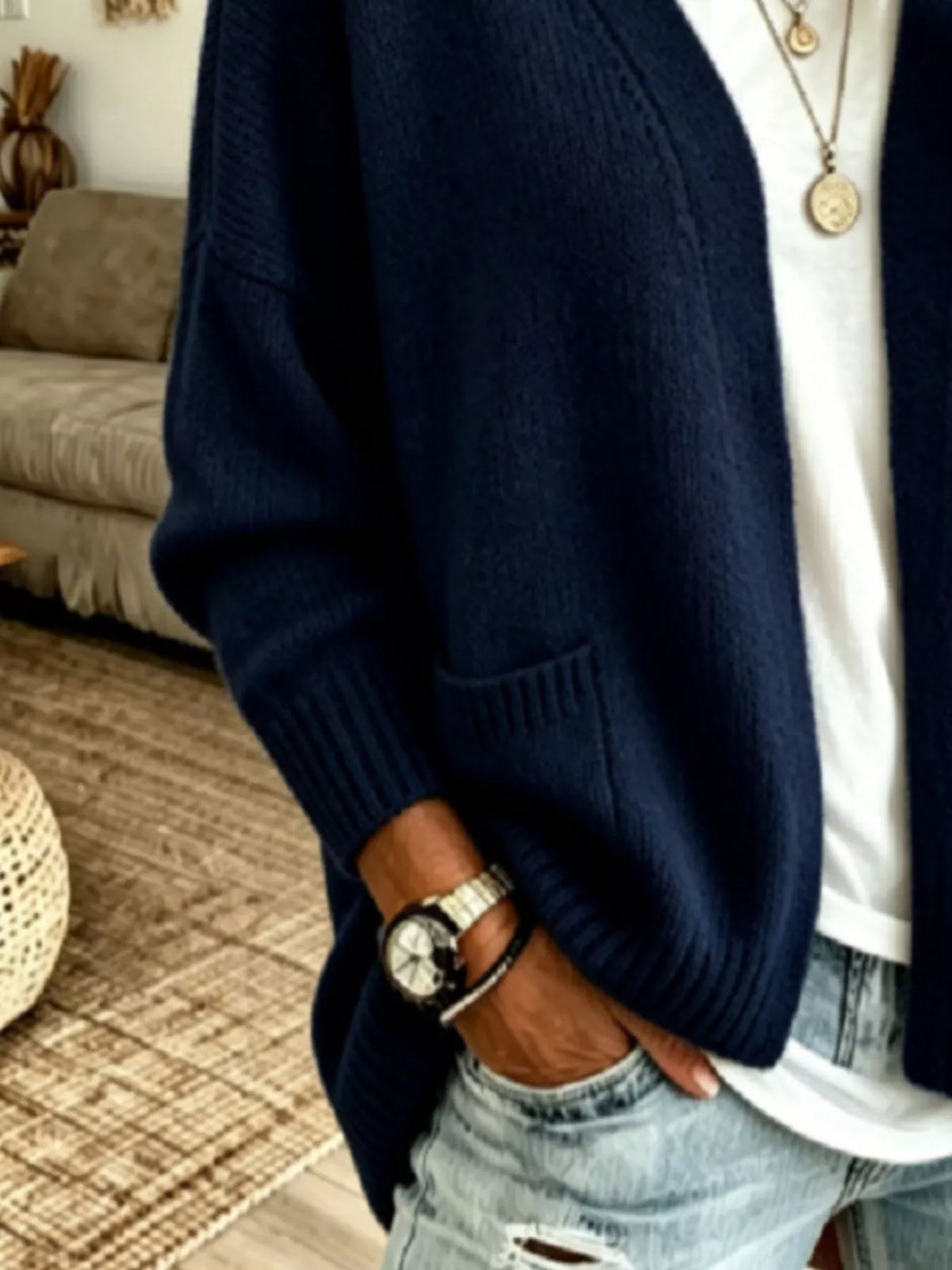 Open front knit cardigan with pockets by Trendsi, featuring a cozy, stylish design and a relaxed fit, perfect for casual wear.