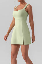 Square neck sleeveless slit mini active dress by Trendsi, featuring a fitted design ideal for workout or casual wear.