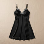 Backless satin slip dress by FitiqueFit featuring lace trim, V-neckline, and a mini length for elegant, stylish wear.