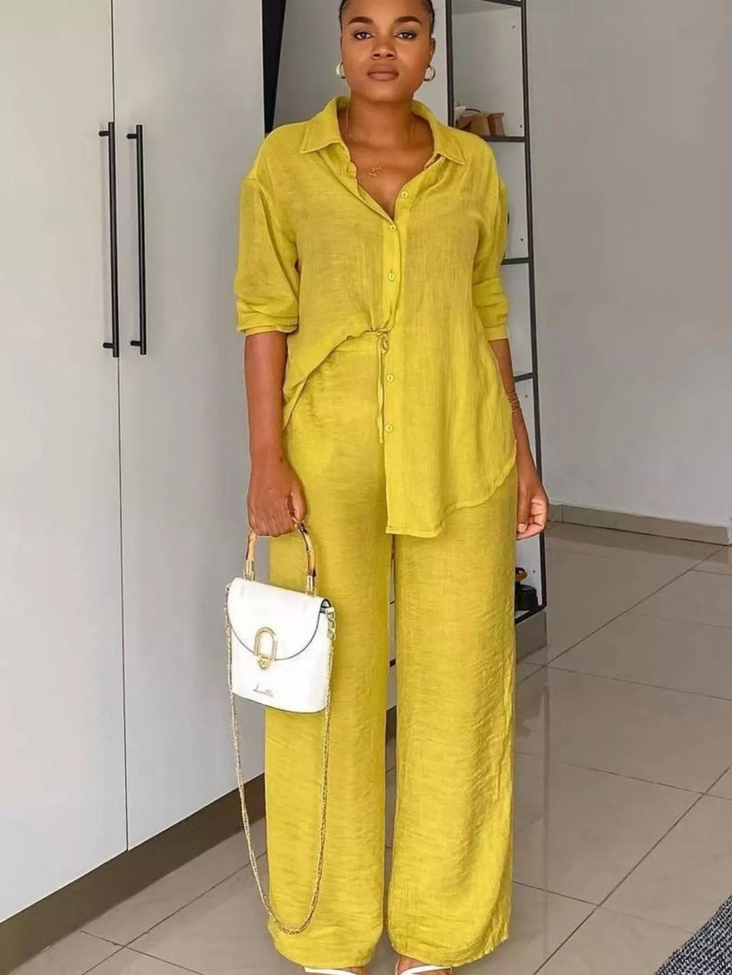 Tie-front top and wide-leg pants set by Shopimist featuring a stylish, coordinated look with a tie-front detail and flowy wide-leg silhouette.
