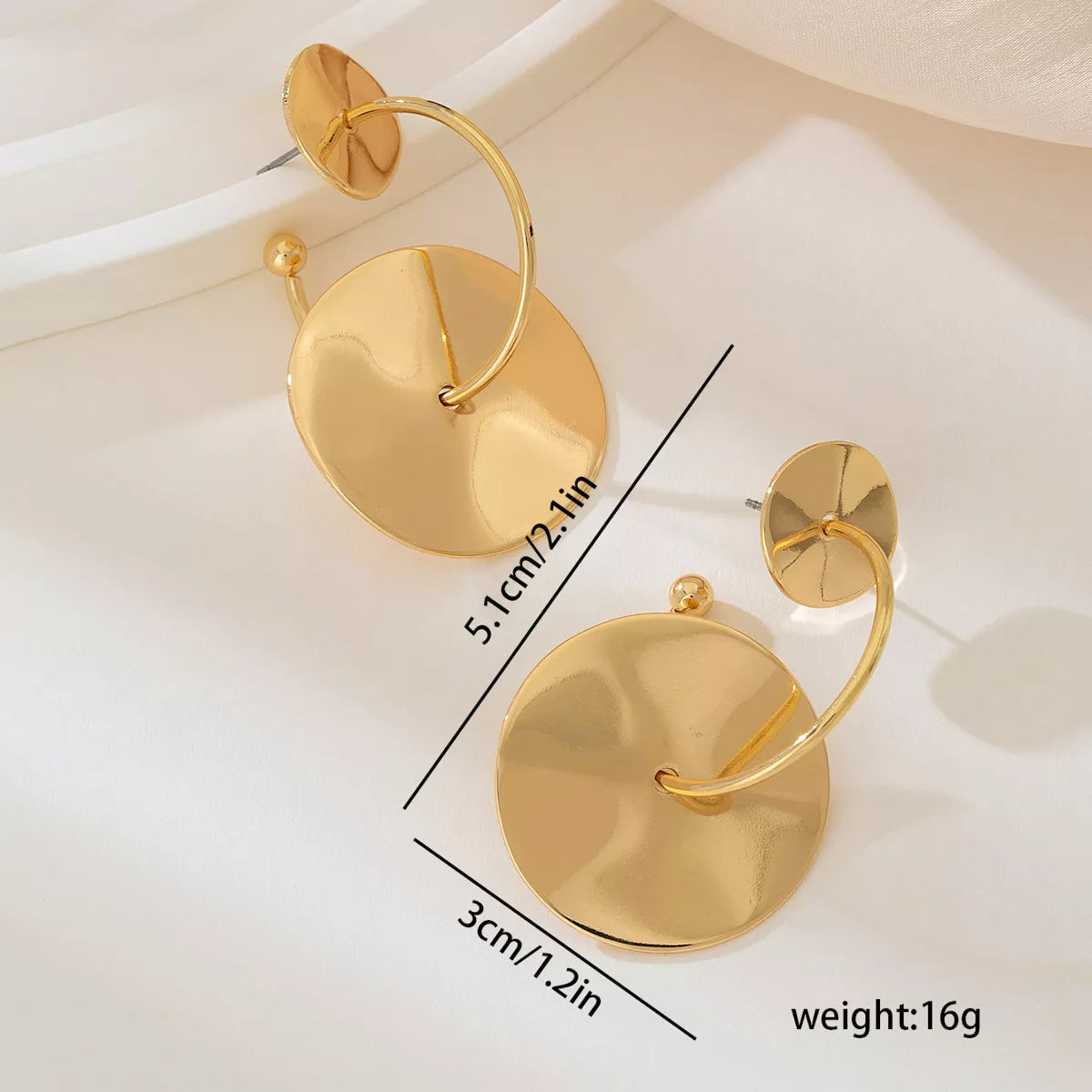 18K gold-plated geometric circle drop earrings with modern design, featuring sleek circular shapes and polished finish.