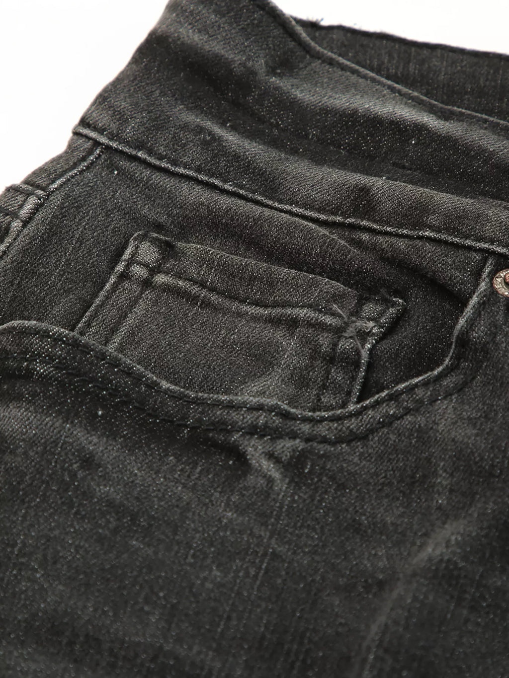 Pair of high waist distressed straight leg jeans by Trendsi featuring a classic denim look and fashionable ripped details.