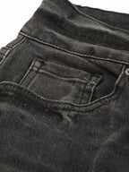 Pair of high waist distressed straight leg jeans by Trendsi featuring a classic denim look and fashionable ripped details.