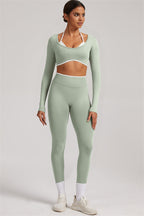 Fitglutes Activewear long sleeve crop top and leggings 2-piece set, athletic gymwear for workout and fitness activities.