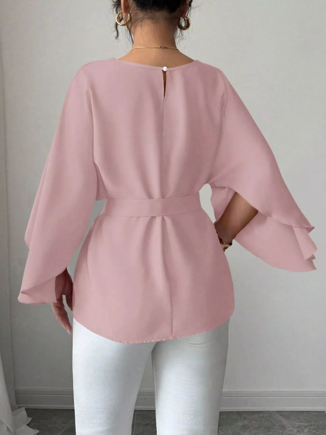 Black batwing sleeve belted blouse by Shopimist featuring a relaxed fit and stylish design, shown on a model.