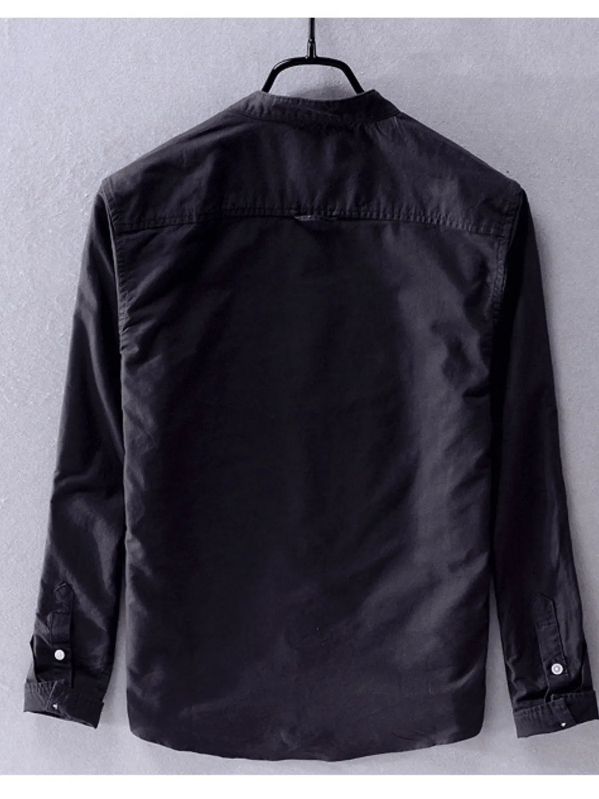 Men's plus size long sleeve button-up shirt by Trendsi, shown in a relaxed fit with a classic collar and front buttons.