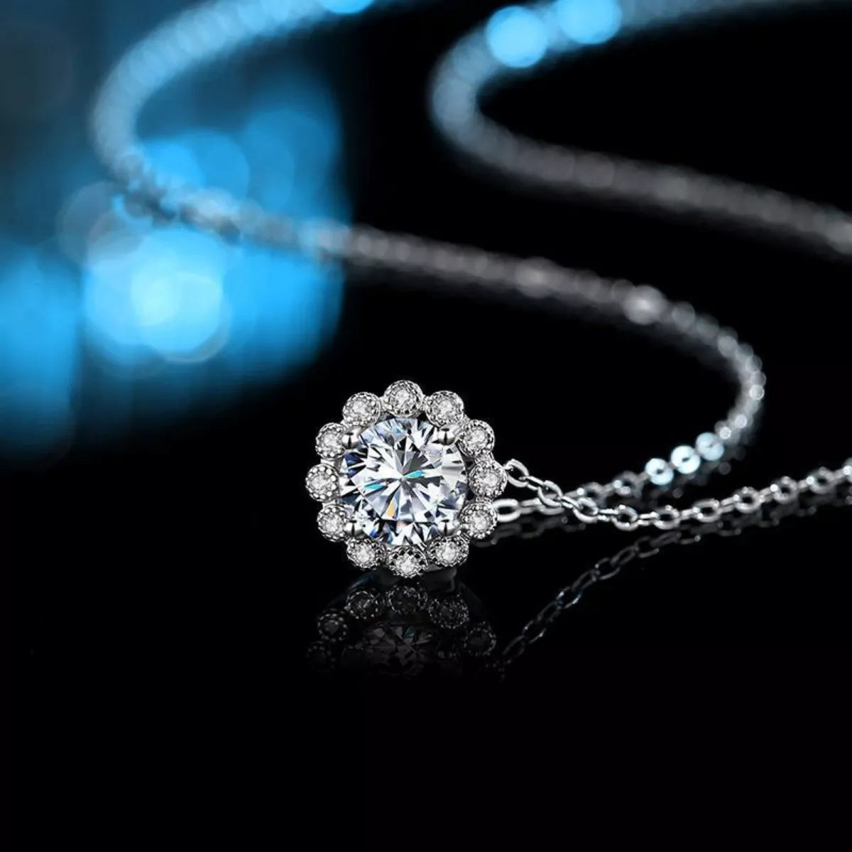 Sterling silver flower necklace with 1 carat moissanite gemstone, elegant jewelry piece with detailed floral design.