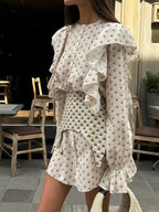 Shopimist ruffled floral print mini dress with feminine details, lightweight fabric, and vibrant flower pattern.