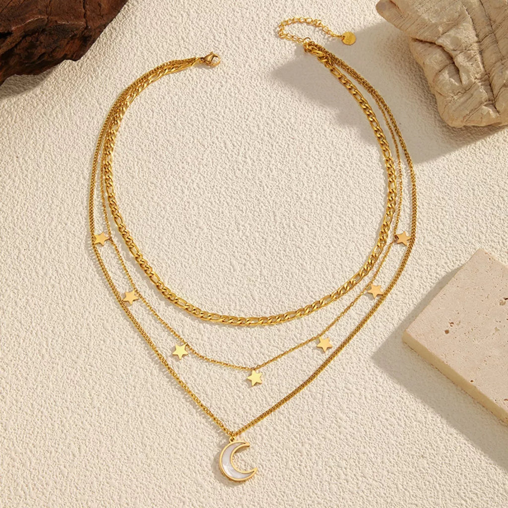18K gold-plated moon three-layered necklace with delicate chain and layered design, showcasing a celestial-inspired jewelry piece