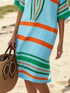 Plus size women's striped half-sleeve midi dress by Plush Fashion Hub, casual chic style, comfortable everyday wear, visible in the image