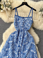 Eyelet embroidered tiered camisole dress, summer boho midi dress with eyelet details and layered design, by Trendsi.