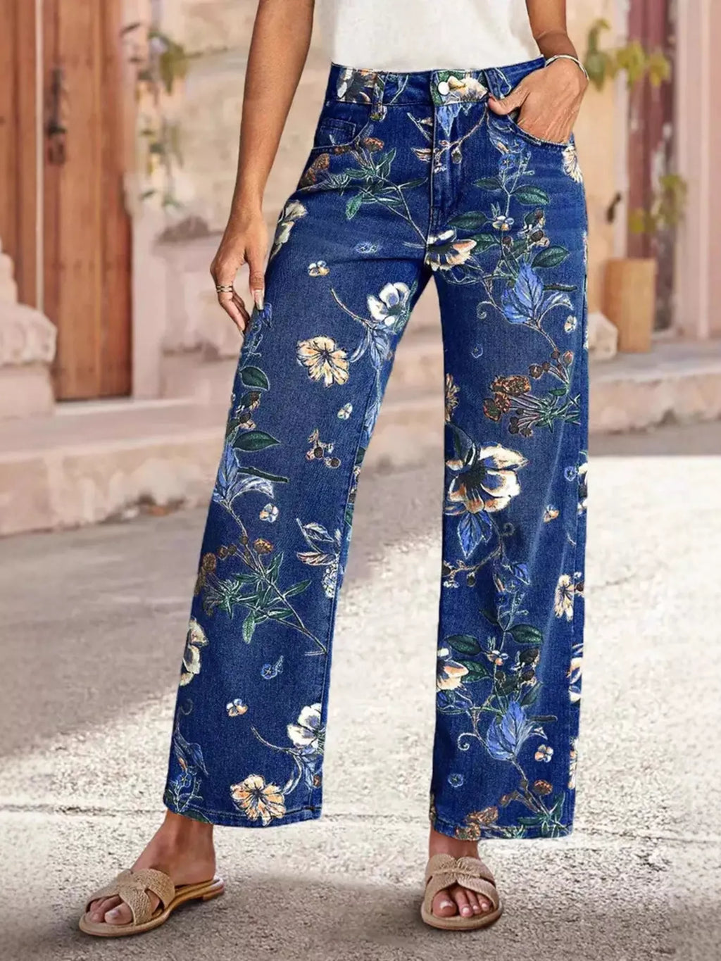 Floral print wide-leg jeans from Trendsi, stylish denim bottoms with a colorful floral pattern and relaxed fit.