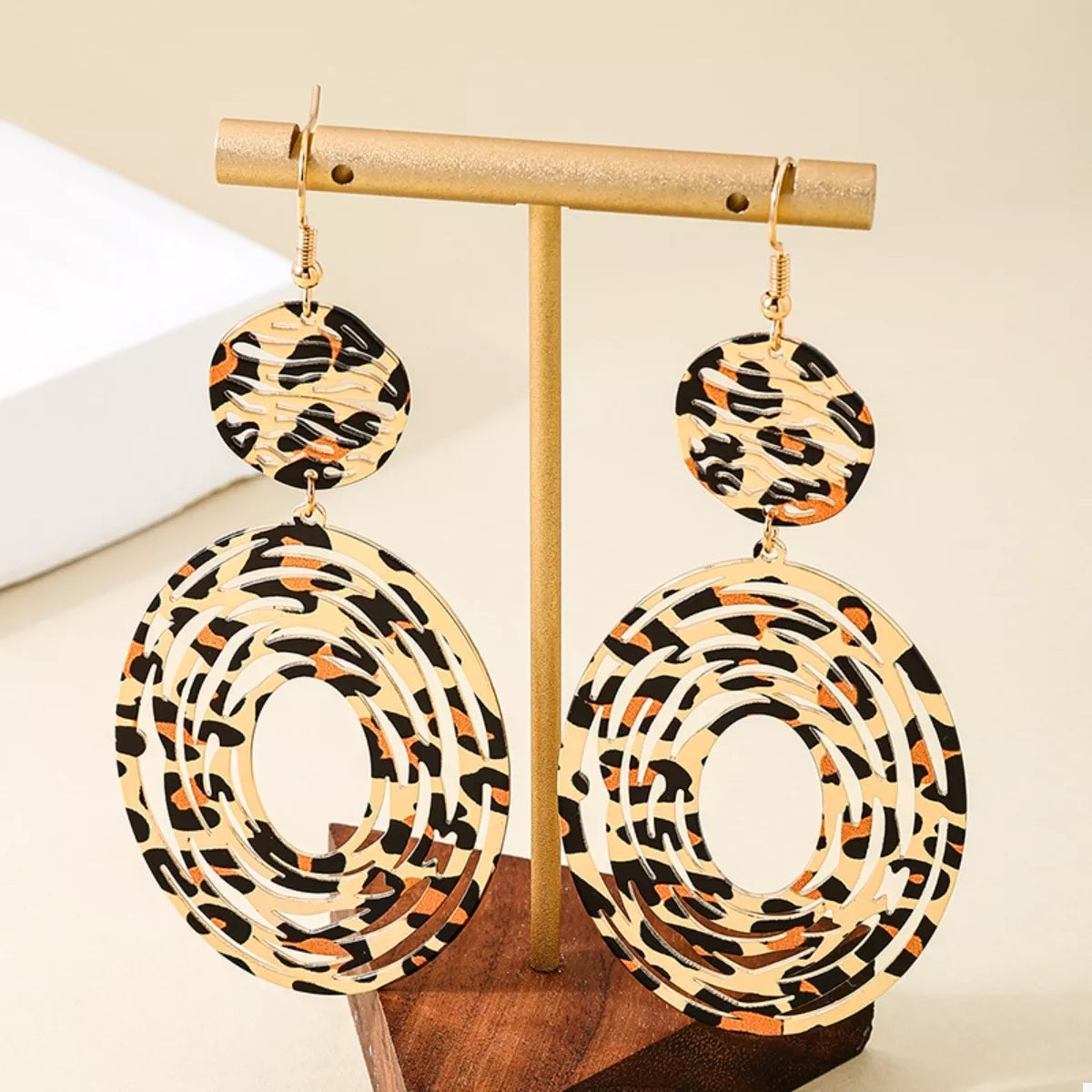 Leopard print dangle earrings by Shopimist featuring gold hooks and bold animal print design for stylish accessories.