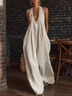 Plus size Shopimist wide-leg jumpsuit with halter neck and lace trim, featuring a full size fit and stylish design.