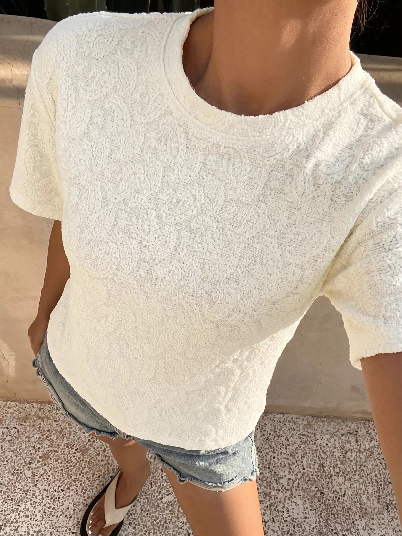 Textured paisley pattern casual t-shirt by Plush Fashion Hub, featuring detailed paisley design on soft, comfortable fabric.