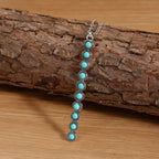 Vintage style beaded bar necklace by Shopimist featuring colorful beads and a sleek metal bar pendant.