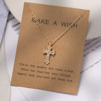 18K gold-plated rhinestone cross necklace with detailed design, featuring sparkling stones and a delicate chain.