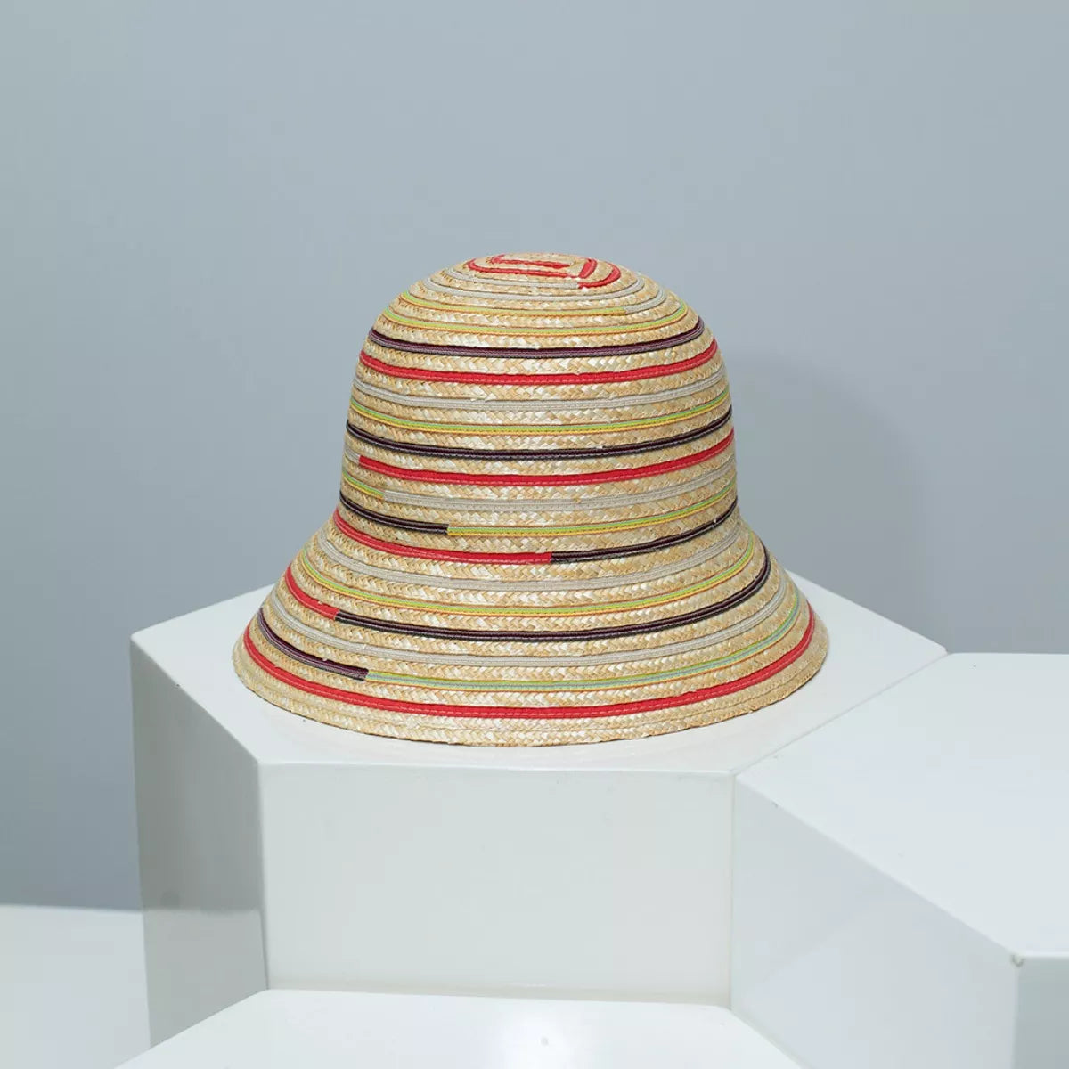 Striped straw bucket hat for women, lightweight summer sun hat with a wide brim, from Plush Fashion Hub.