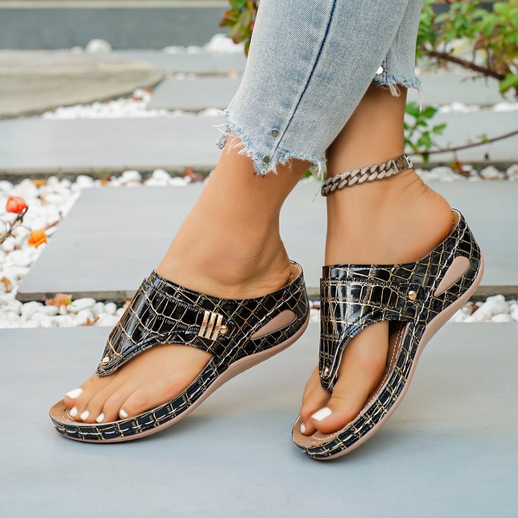 Women's stylish faux leather toe post wedge sandals with mid-heel, featuring comfortable design and trendy appearance.