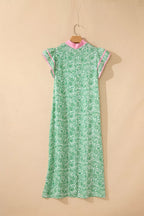 Flutter sleeve floral midi dress with contrast trim by Plush Fashion Hub, featuring a feminine, flowing design and vibrant floral pattern.