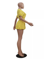 Shopimist zip-up crop top and shorts set, stylish matching athletic wear shown on a model with a casual pose.
