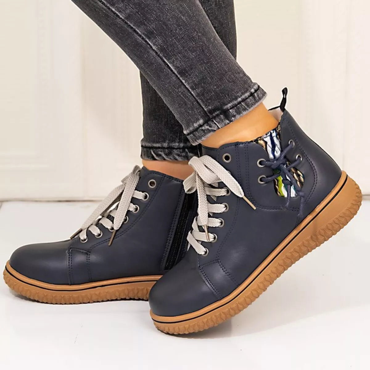 Women's round toe platform ankle boots by Trendsi, featuring a stylish design with a chunky heel and smooth finish.