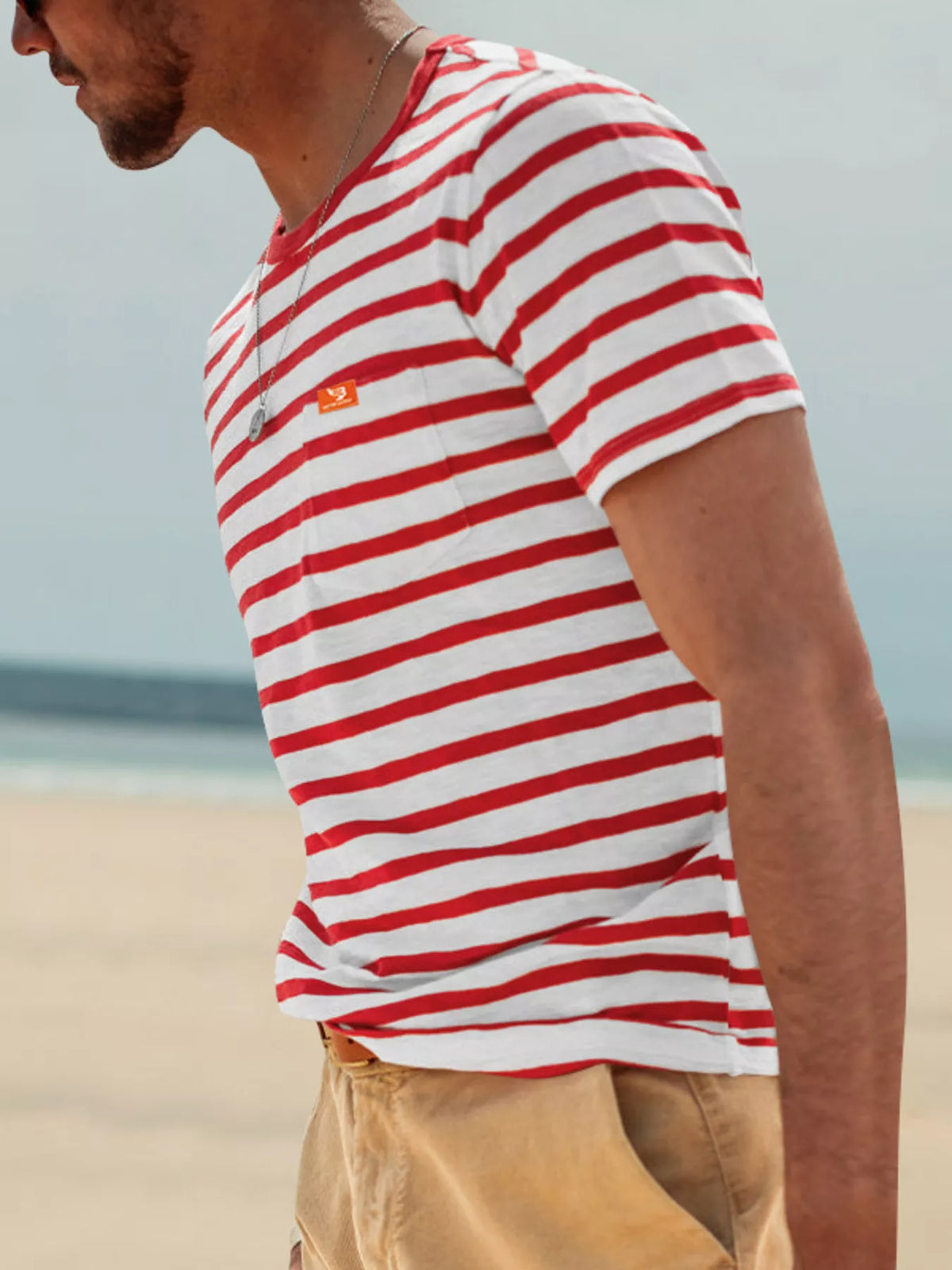 Men's plus size striped pocket short sleeve t-shirt by Plush Fashion Hub, featuring a casual fit and chest pocket detail.