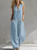 Plus size Shopimist sleeveless V-neck wide-leg jumpsuit, full-length jumpsuit with a relaxed fit and wide-leg design.