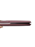 Trendsi 2-in-1 professional hair straightener and curling iron with black and silver design and dual ceramic plates.