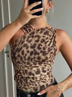 Leopard print asymmetrical ruched bodysuit featuring stylish animal print and one-piece design, perfect as a trendy top.