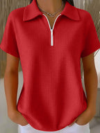 Drop shoulder half-zip waffle knit top with 3/4 sleeves by Plush Fashion Hub, featuring a cozy textured fabric and relaxed fit.