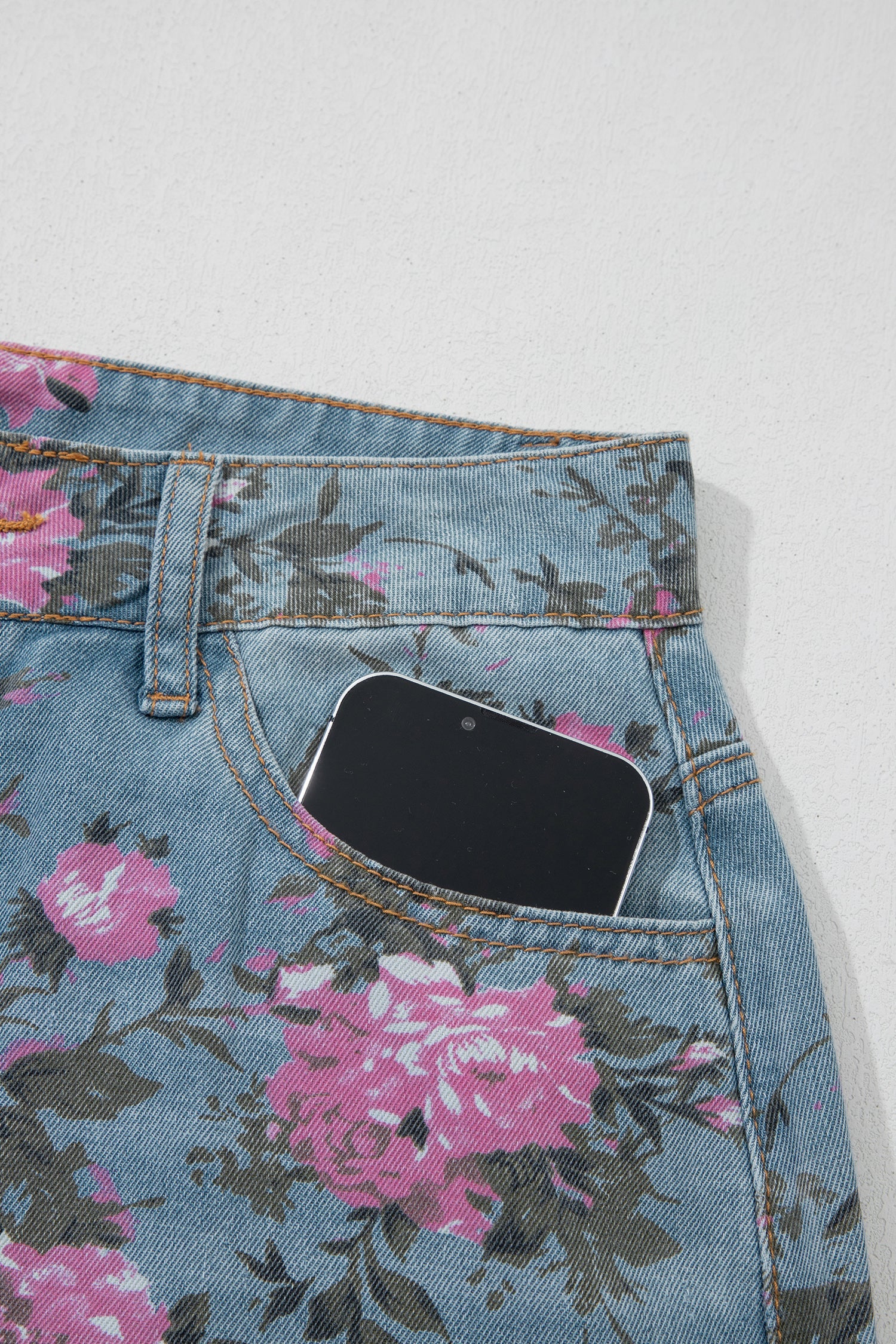 Esme floral print bootcut jeans by Threaded Pear, showcasing colorful floral patterns and classic denim fit.
