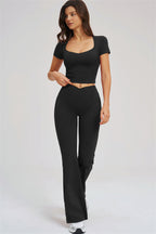 Fitglutes Activewear Sizzle T-shirt and flared leggings 2-piece gym set, black sportswear for workout and active wear.