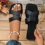 Plush Fashion Hub crisscross strap open toe flat sandals featuring a stylish design and comfortable fit.