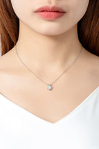 Heart-shaped 1 carat moissanite pendant necklace featuring a sparkling gemstone on a delicate chain.